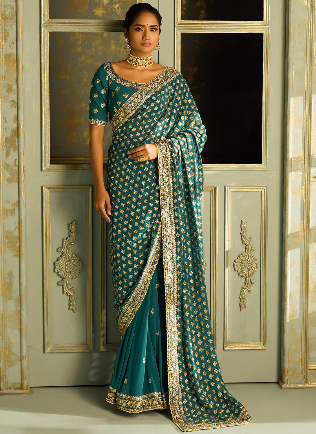 Teal Embroidered Georgette Saree