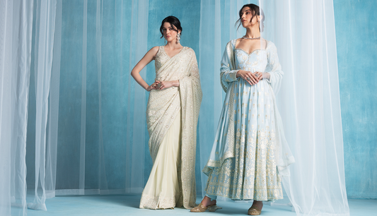 Two women modeling traditional Indian attire made of gorgette fabric