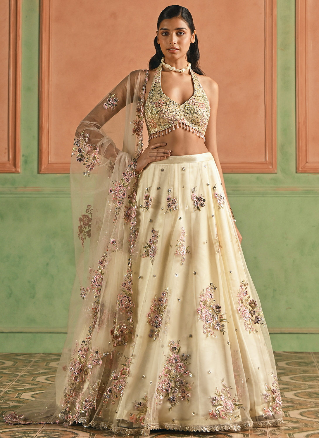 Ivory Embroidered Net Lehenga