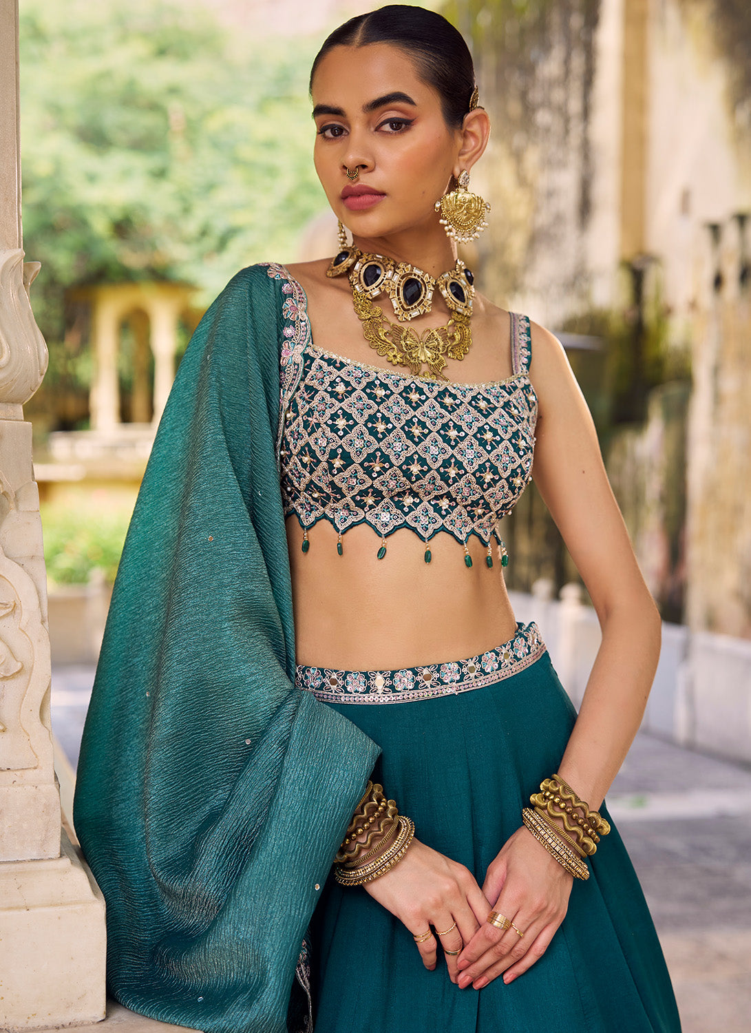 Teal Green Embroidered Silk Lehenga