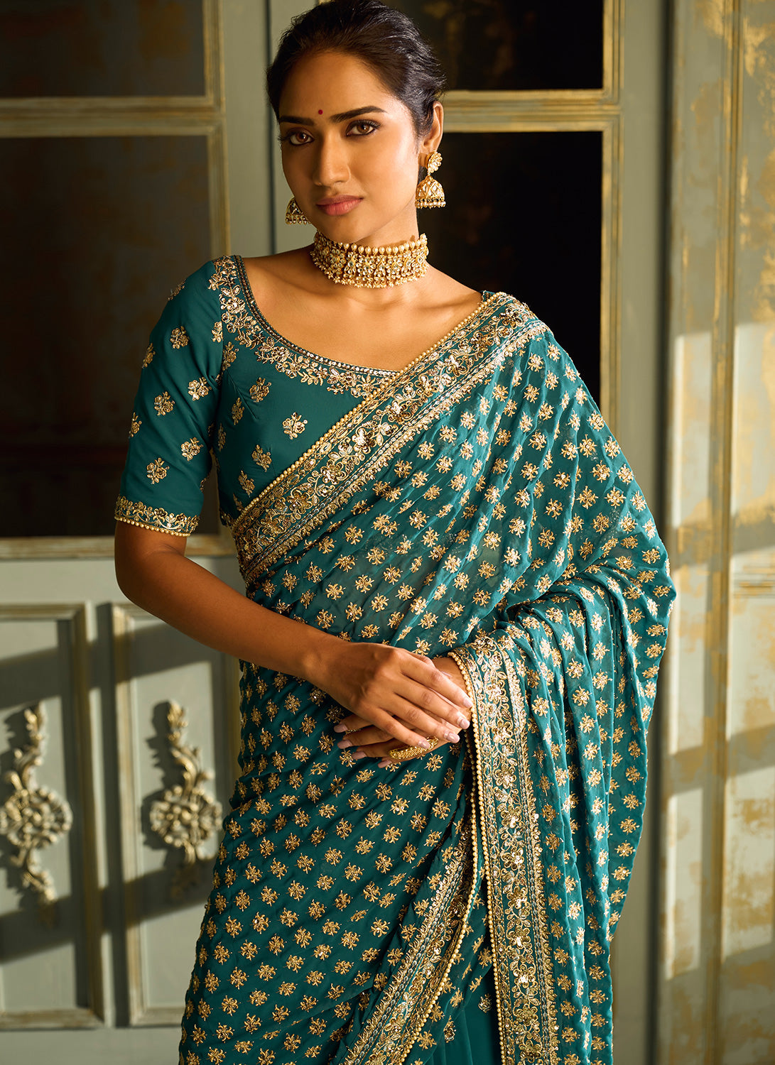 Teal Embroidered Georgette Saree