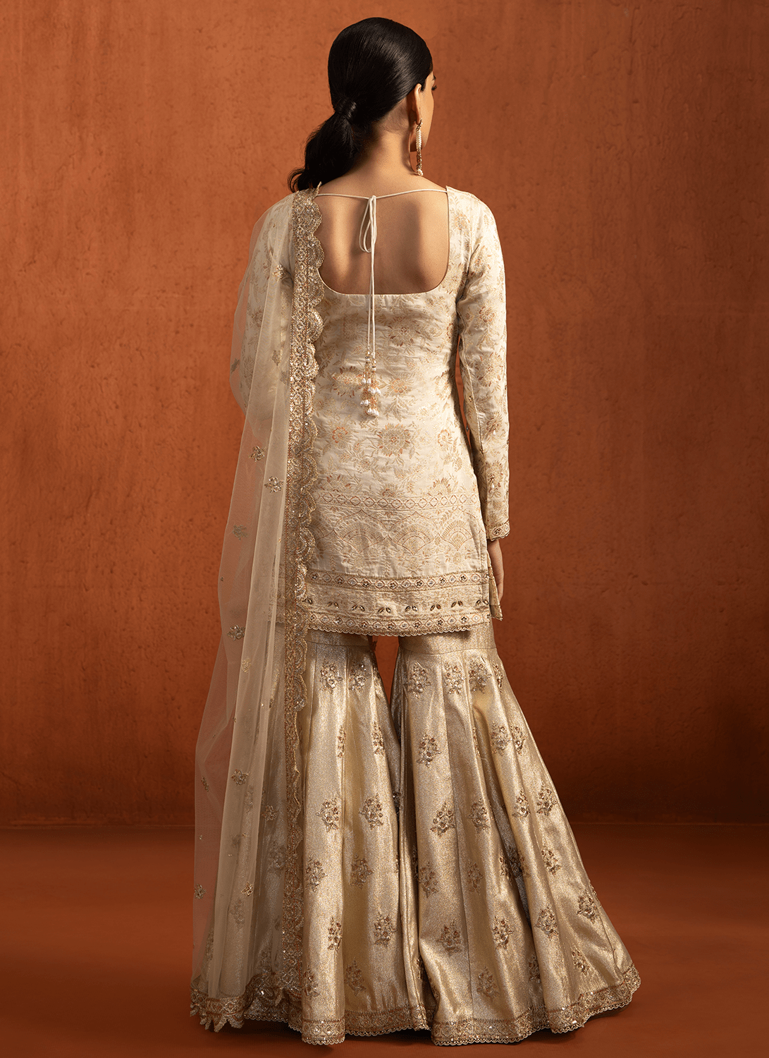 Off White & Golden Embroidered Brocade Gharara Suit Off White & Golden Embroidered Brocade Gharara Suit