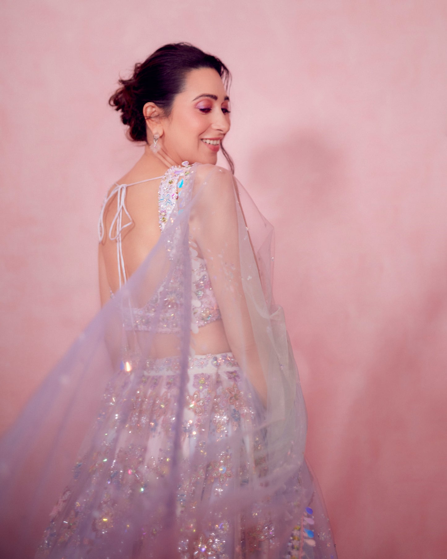 Karisma Kapoor in Ombre Pink and Blue Heavy Embellished Lehenga