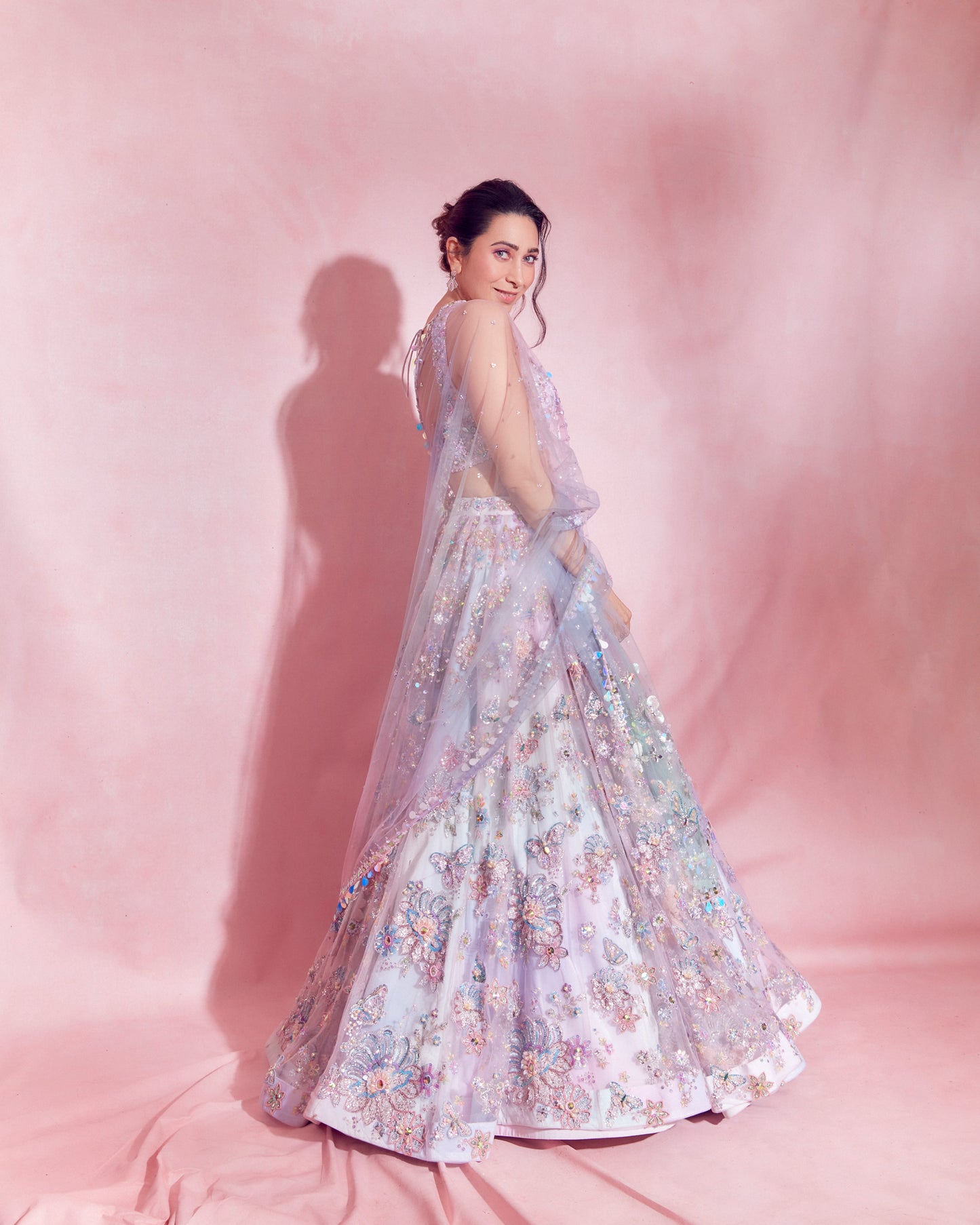 Karisma Kapoor in Ombre Pink and Blue Heavy Embellished Lehenga