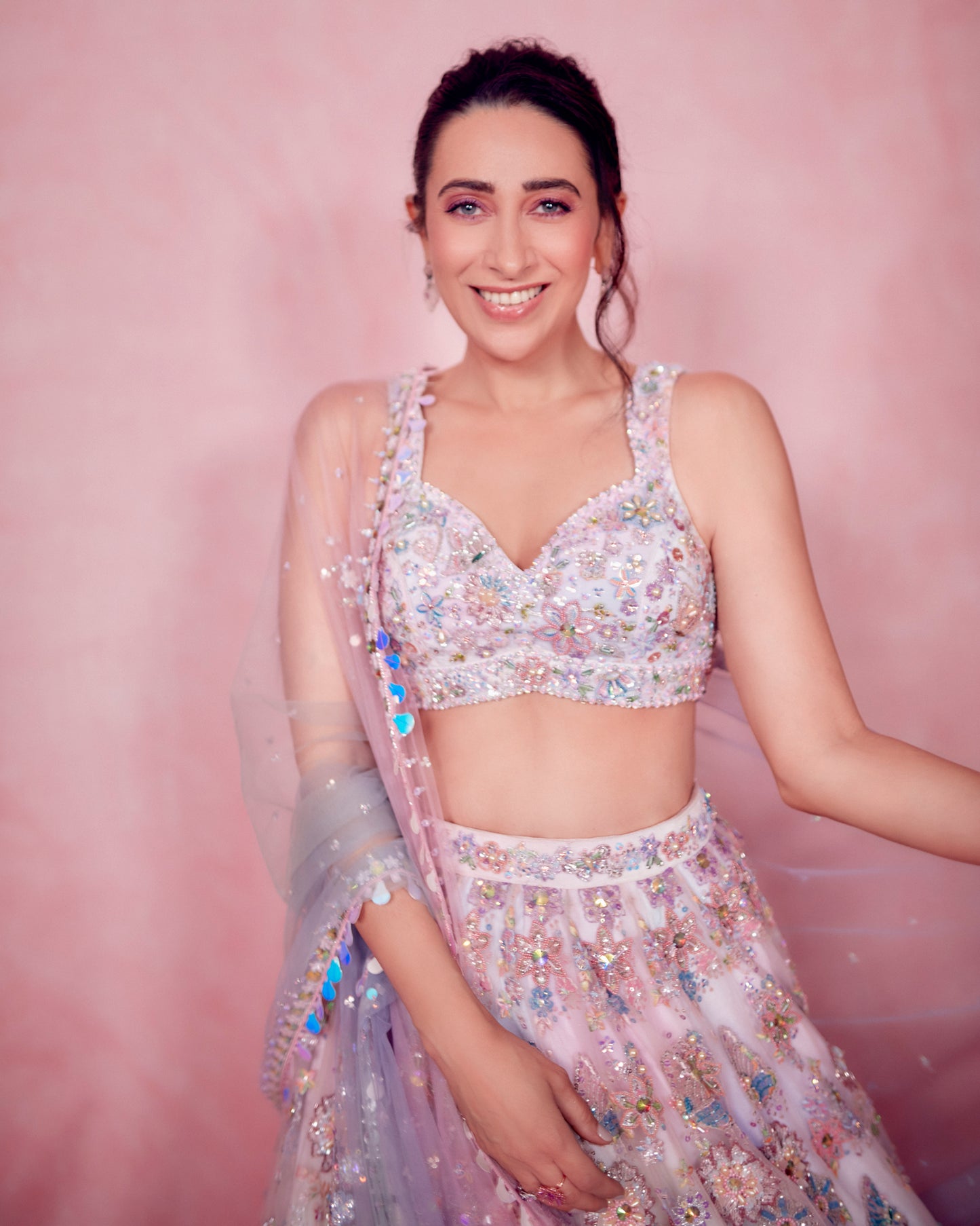 Karisma Kapoor in Ombre Pink and Blue Heavy Embellished Lehenga